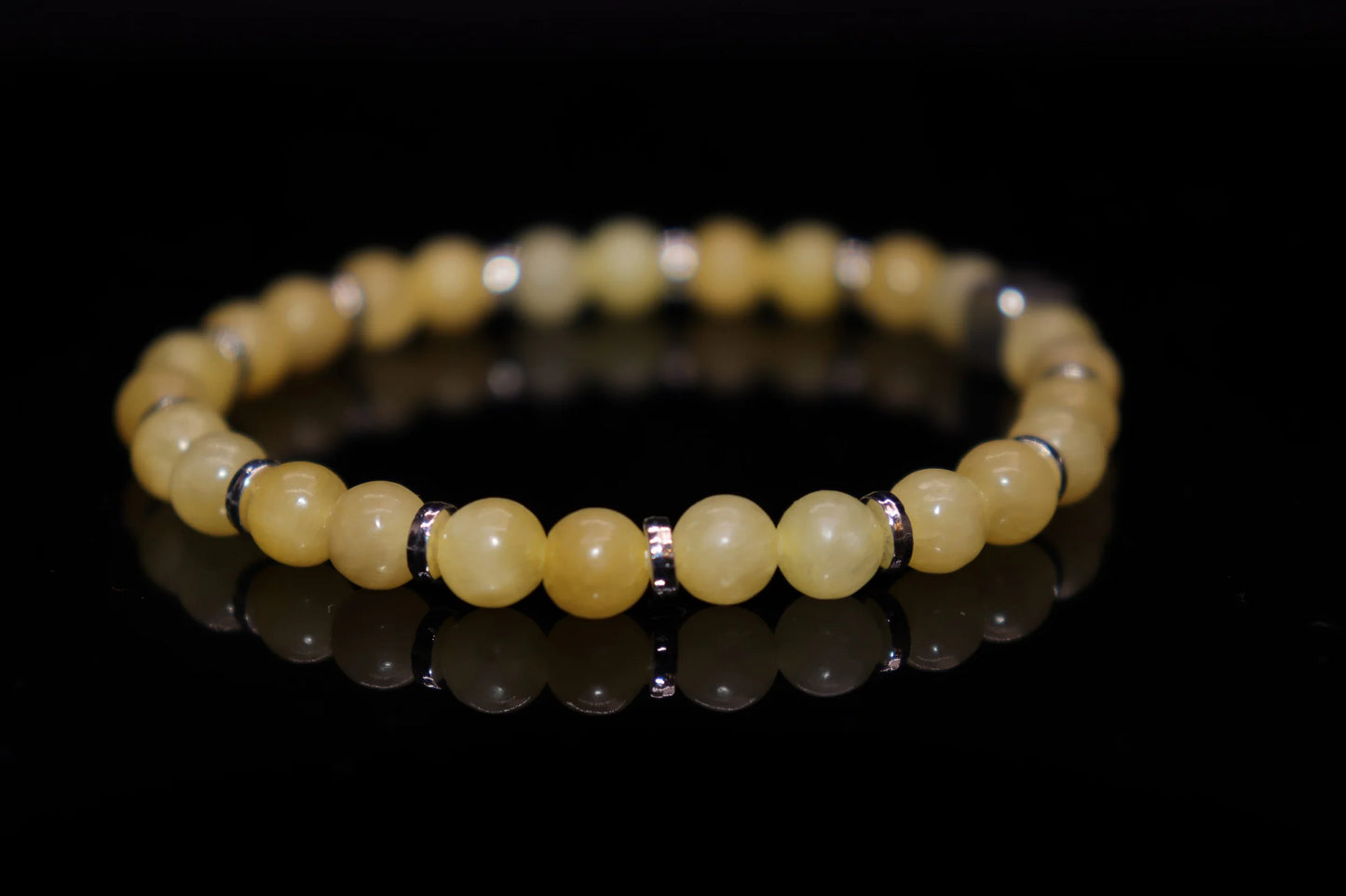 Topaz bracelet lifestyle photo for peace and friendship harmony, hope and protection from negative energy, November birthstone wisdom accessory