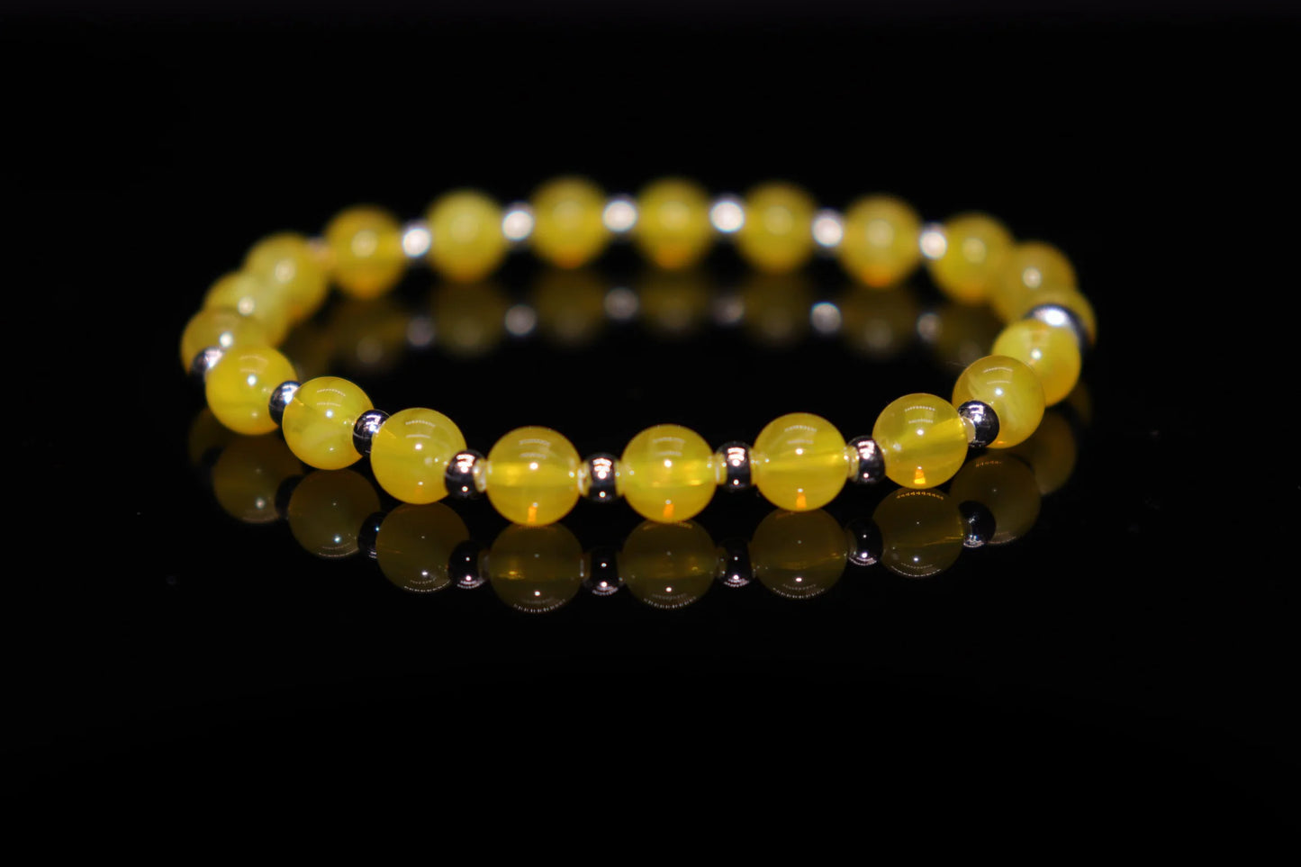 Amber silver bracelet from Baltic Norse mythology, goddess Freyja's tears symbolizing forbidden love and eternal sorrow, Viking heritage jewelry