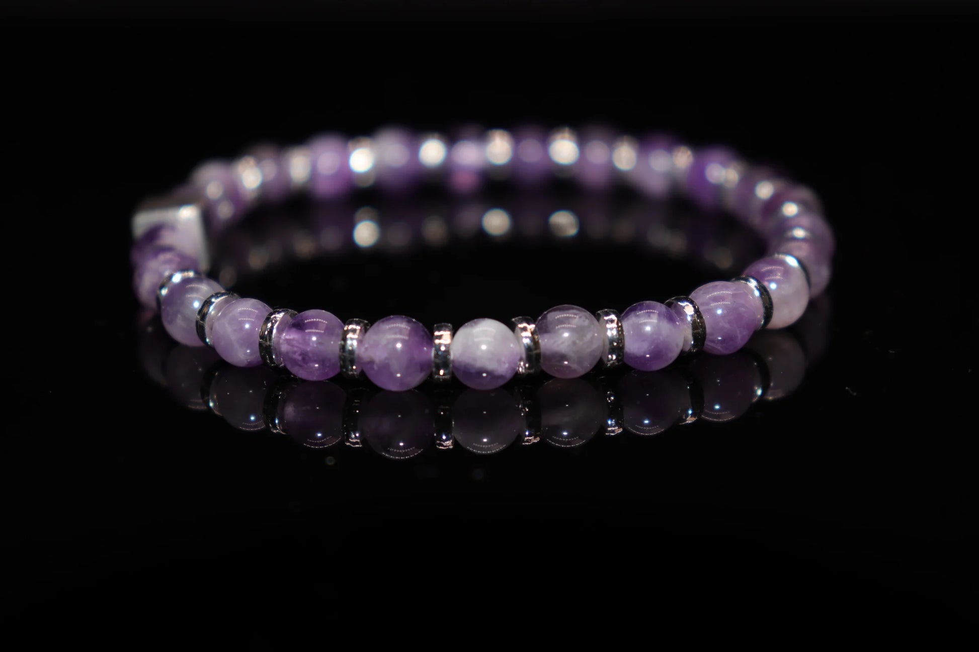 Amethyst February birthstone bracelet associated with St. Valentine, symbol of eternal love and loyalty, perfect romantic gift jewelry