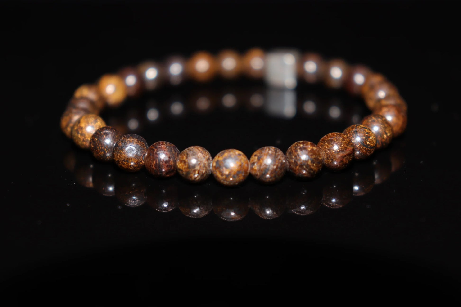 Copper ore silver bracelet worn on wrist, primal earth grounding energy jewelry for physical healing and emotional balance, wellness accessory