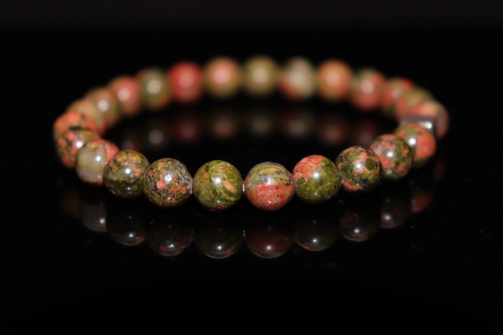Dragon blood jasper Jungian psychology unconscious energy release bracelet, red veins symbolize liberation of subconscious power, depth psychology jewelry