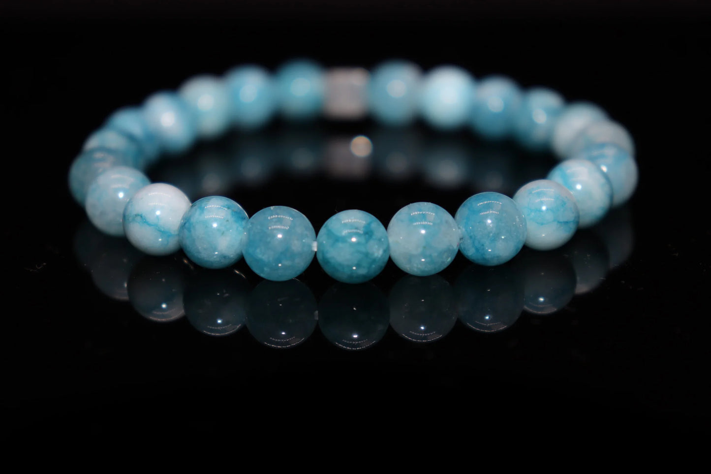 Larimar Virgin Mary mantle Christian sea protection bracelet, Victorian-era sacred stone with white wave textures symbolizing the Holy Mother's cloak