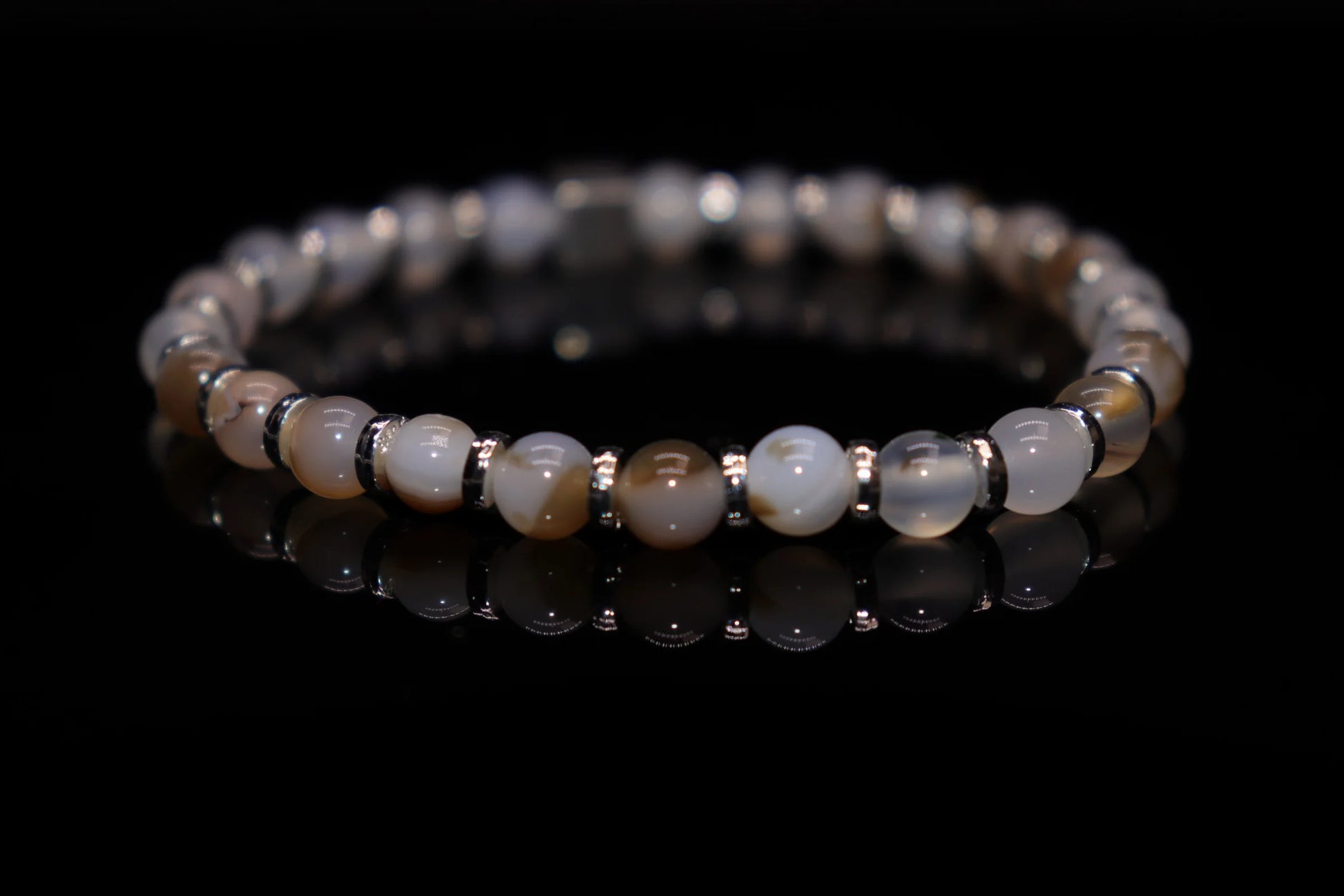 Moss agate silver bracelet worn on wrist, June birthstone jewelry of hope and rebirth, medieval farmer harvest abundance talisman healing accessory