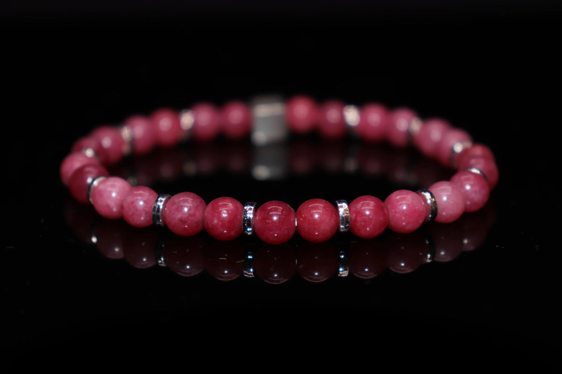 Rhodochrosite silver bracelet worn on wrist, ultimate love stone jewelry for heart chakra opening and positive relationship attraction, romantic accessory