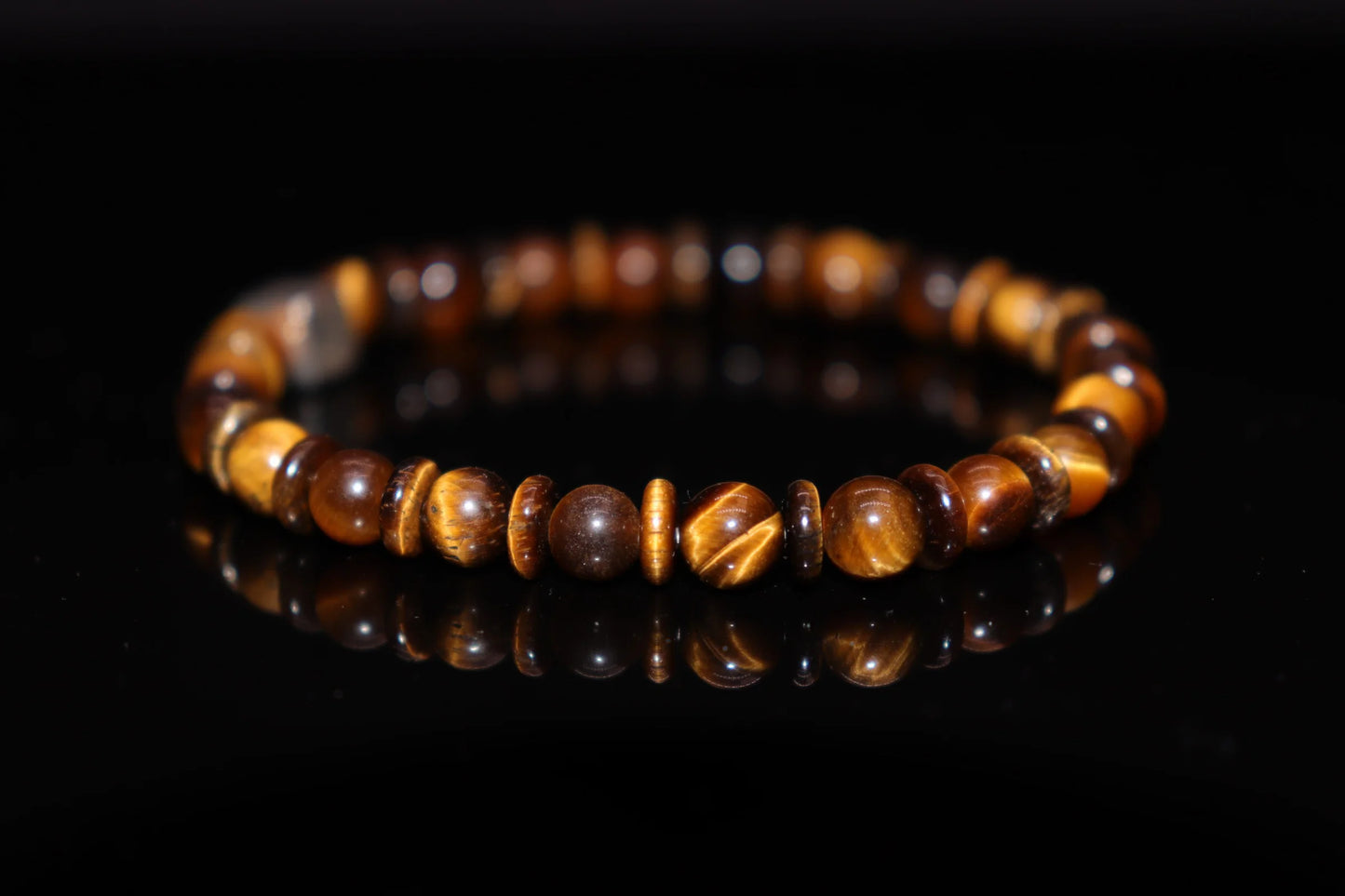 Tiger eye silver bracelet worn on wrist, courage and protection crystal jewelry for willpower and decision-making, solar plexus chakra healing accessory