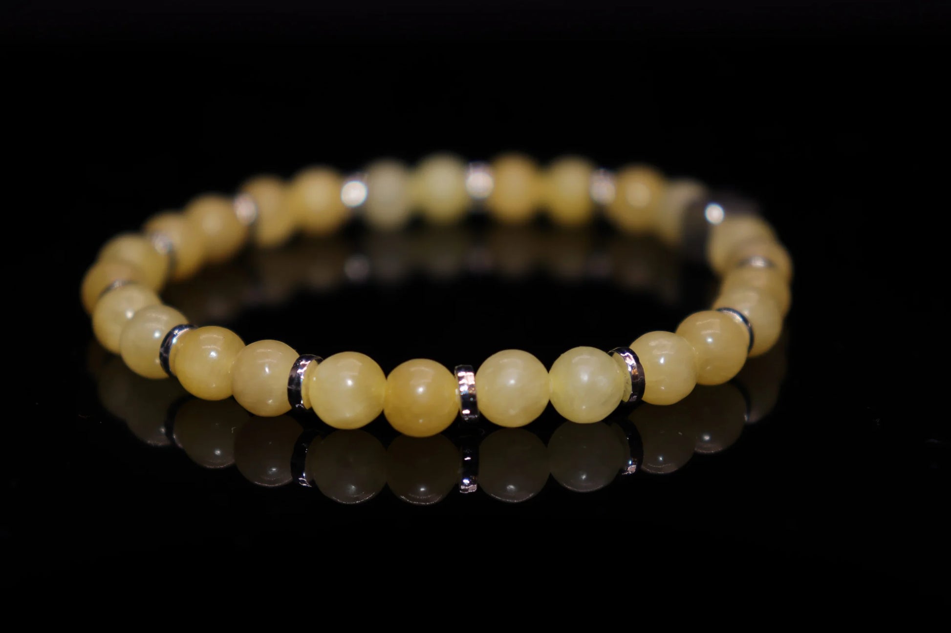 Topaz bracelet lifestyle photo for peace and friendship harmony, hope and protection from negative energy, November birthstone wisdom accessory